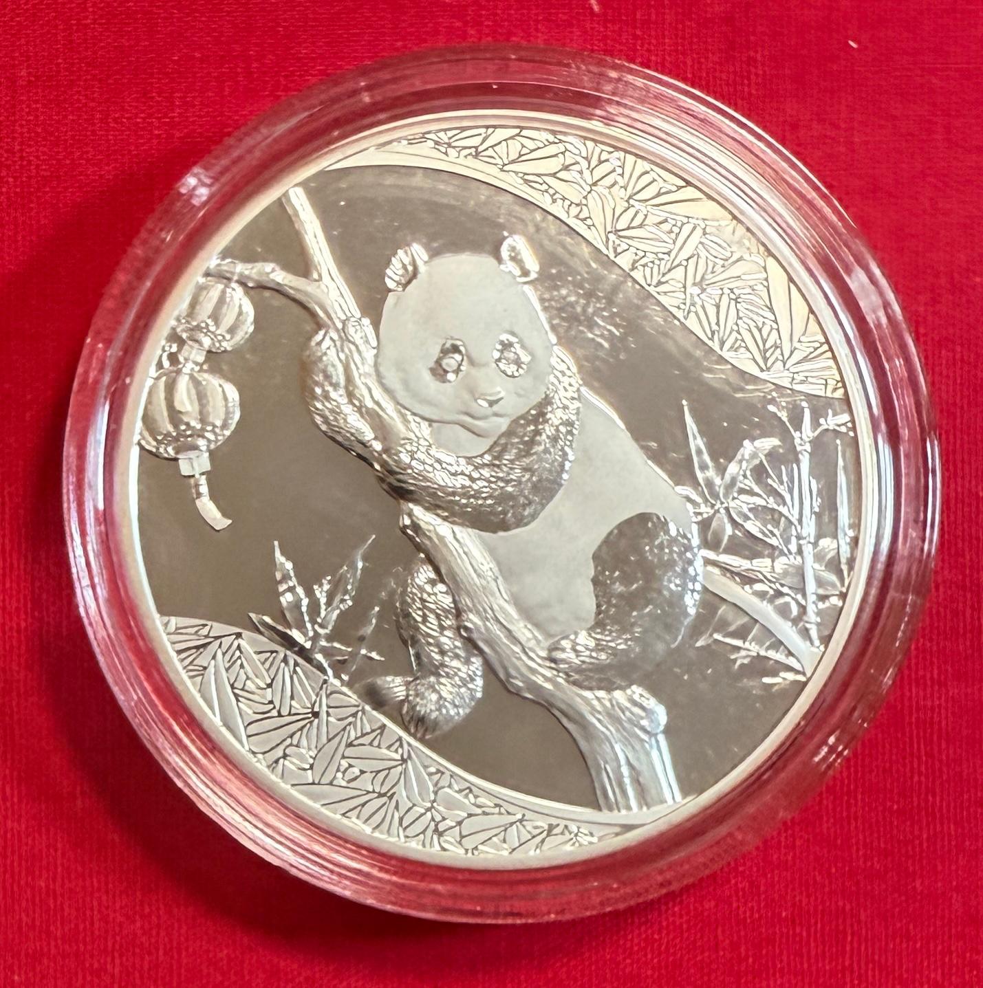 Motiv 1 - 1 Unze Silber Panda 2025 World Money Fair 